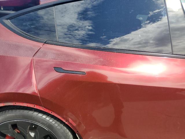 7SAYGDEF9PF794322 - 2023 TESLA MODEL Y BURGUNDY photo 11