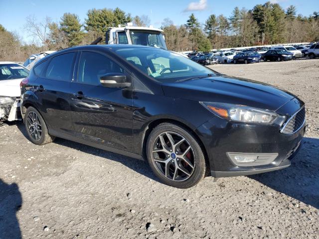 1FADP3M25HL311191 - 2017 FORD FOCUS SEL BLACK photo 4