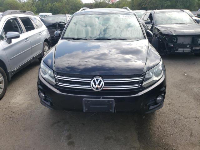 WVGBV7AX9DW543778 - 2013 VOLKSWAGEN TIGUAN S შავი ფოტო 5