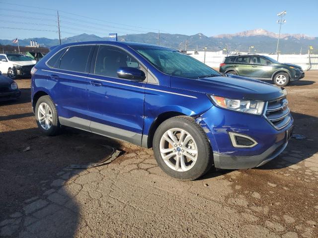 2FMTK4J96FBC39728 - 2015 FORD EDGE SEL BLUE photo 4