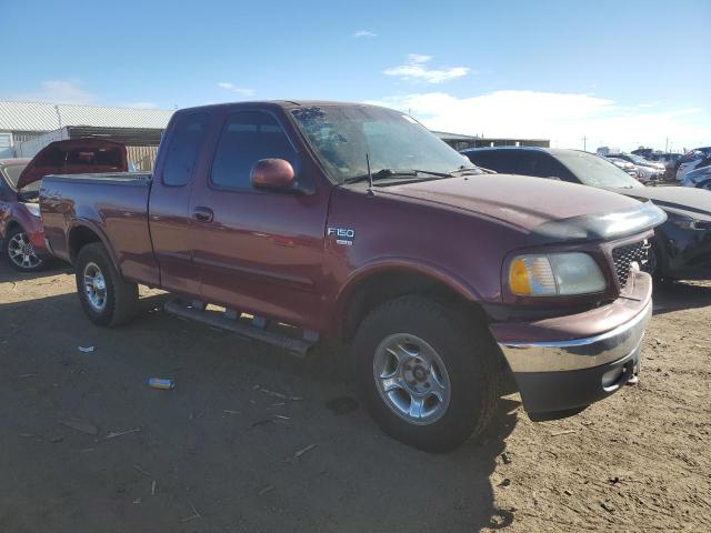 1FTRX18LXXKB96518 - 1999 FORD F150 BURGUNDY photo 4