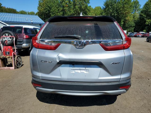 2HKRW6H39JH206008 - 2018 HONDA CR-V LX ვერცხლისფერი ფოტო 6