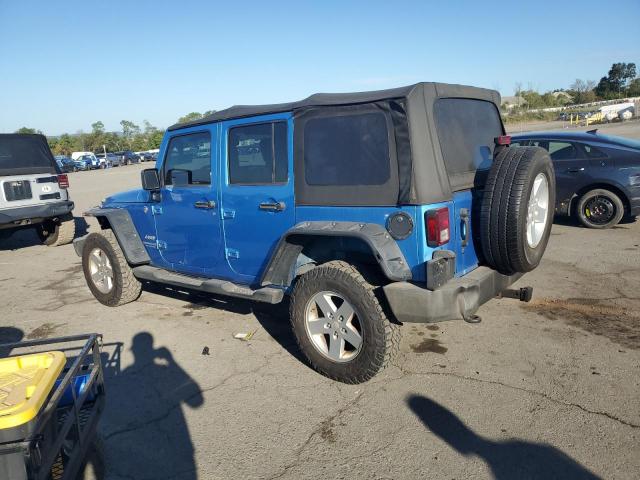 1J4HA3H10AL150800 - 2010 JEEP WRANGLER U SPORT Синий фото 2