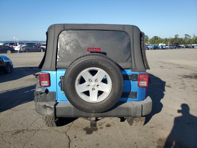 1J4HA3H10AL150800 - 2010 JEEP WRANGLER U SPORT Синий фото 6