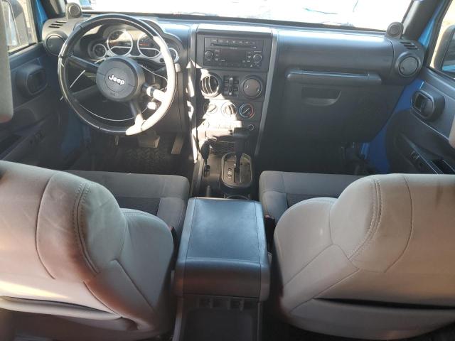 1J4HA3H10AL150800 - 2010 JEEP WRANGLER U SPORT Синий фото 8