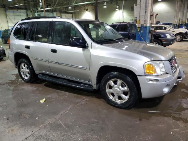 1GKDT13S572214142 - 2007 GMC ENVOY SILVER photo 4