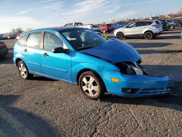 1FAHP37N47W159473 - 2007 FORD FOCUS ZX5 BLUE photo 4