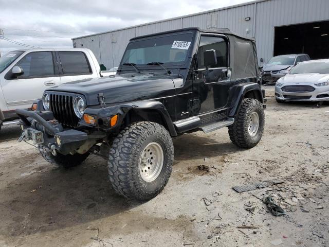 1J4FY49S3XP492033 - 1999 JEEP WRANGLER / SAHARA BLACK photo 1