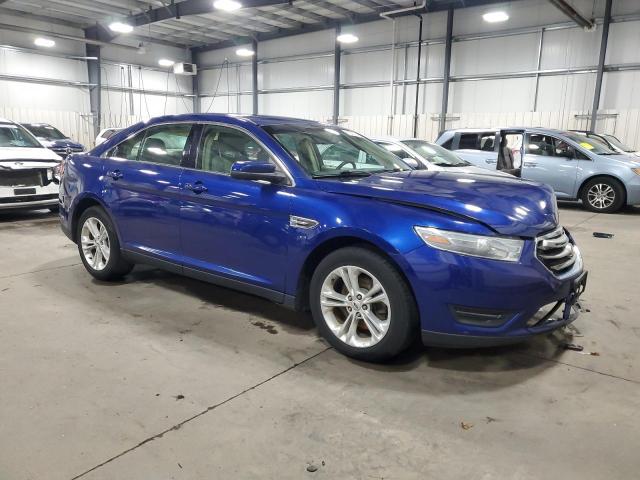 1FAHP2E86EG124514 - 2014 FORD TAURUS SEL BLUE photo 4