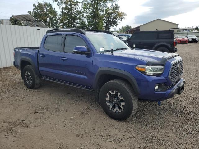 3TYCZ5AN4NT103523 - 2022 TOYOTA TACOMA DOUBLE CAB BLUE photo 4
