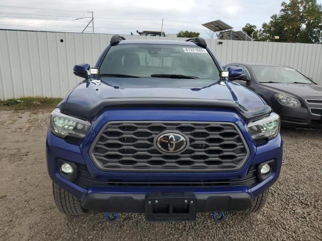 3TYCZ5AN4NT103523 - 2022 TOYOTA TACOMA DOUBLE CAB BLUE photo 5
