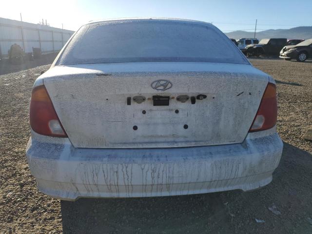 KMHCF35C13U255443 - 2003 HYUNDAI ACCENT L WHITE photo 6