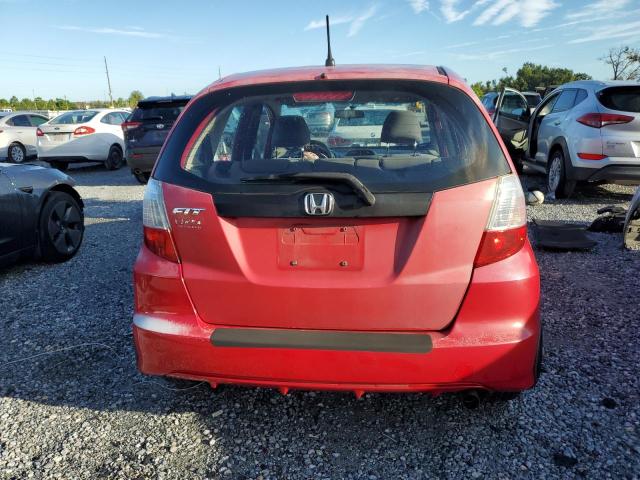 JHMGE8H38CS007802 - 2012 HONDA FIT RED photo 6