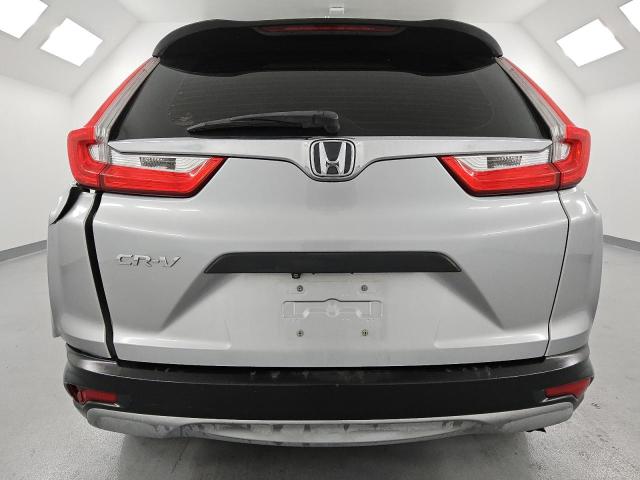 2HKRW5H31HH401069 - 2017 HONDA CR-V LX Күміс фото 6