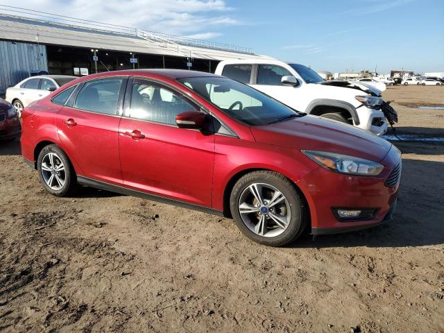 1FADP3FE8HL284219 - 2017 FORD FOCUS SE RED photo 4