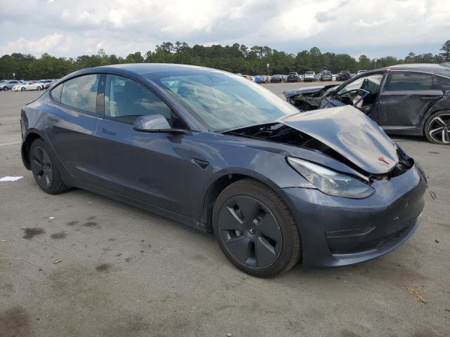 5YJ3E1EA5PF544396 - 2023 TESLA MODEL 3 Grau Foto 4
