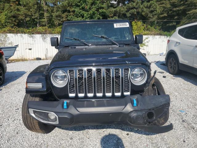 1C4JJXP69NW256727 - 2022 JEEP WRANGLER U SAHARA 4XE BLACK photo 5