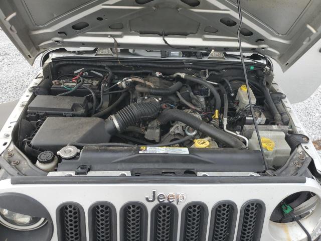 1J4AA2D11AL228325 - 2010 JEEP WRANGLER SPORT SILVER photo 11