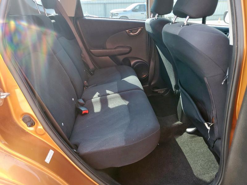 JHMGE884X9S074323 - 2009 HONDA FIT SPORT ORANGE photo 10