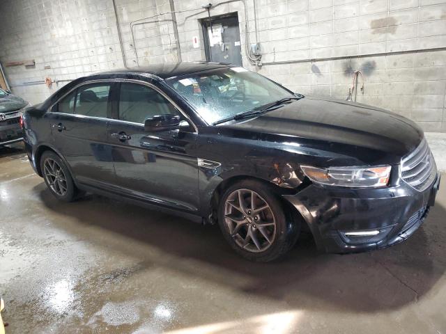 1FAHP2E86GG133930 - 2016 FORD TAURUS SEL BLACK photo 4