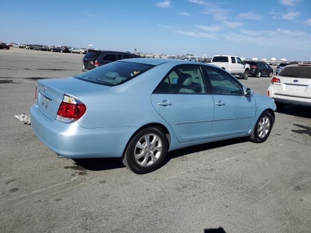 4T1BF30K95U618472 - 2005 TOYOTA CAMRY LE ლურჯი ფოტო 3