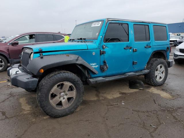 1J4HA5H13BL523910 - 2011 JEEP WRANGLER U SAHARA TEAL photo 1