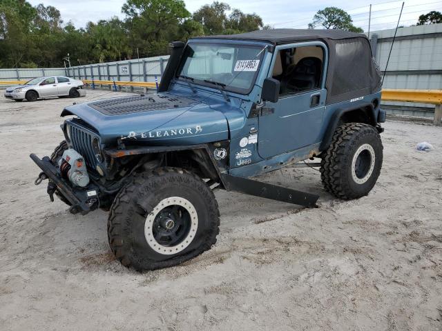 1J4FY19S0XP439238 - 1999 JEEP WRAGLR SPT SPORT BLUE photo 1