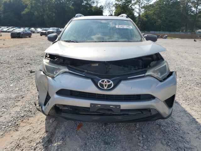 2T3ZFREV4GW305540 - 2016 TOYOTA RAV4 LE ვერცხლისფერი ფოტო 5