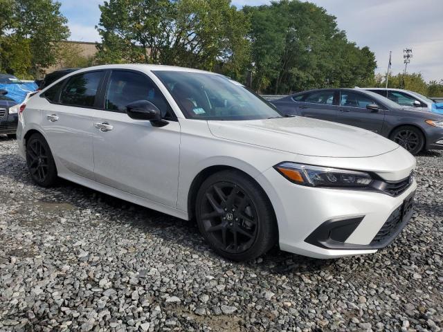 2HGFE2F54PH550707 - 2023 HONDA CIVIC SPORT WHITE photo 4