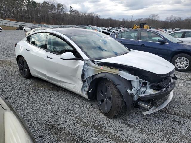 5YJ3E1EA4PF427747 - 2023 TESLA MODEL 3 WHITE photo 4