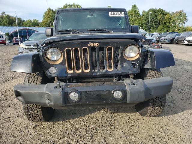 1C4HJWEG6EL165582 - 2014 JEEP WRANGLER U SAHARA შავი ფოტო 5