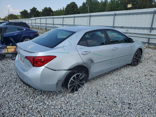2T1BURHEXKC175642 - 2019 TOYOTA COROLLA L فضي صورة 3