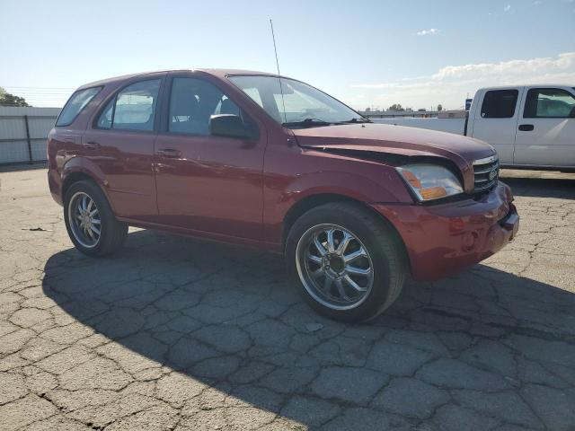 KNDJD735X85816558 - 2008 KIA SORENTO EX RED photo 4
