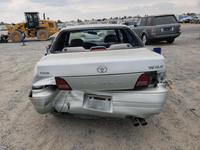 4T1GK13E4SU076673 - 1995 TOYOTA CAMRY XLE Silber Foto 6