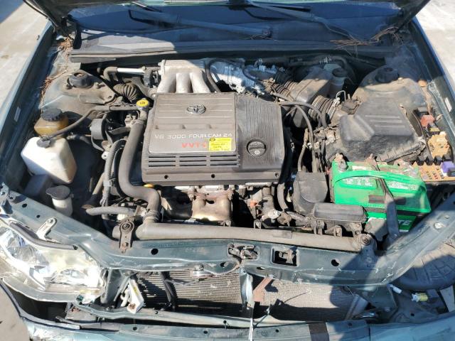 4T1BF28B42U257419 - 2002 TOYOTA AVALON XL GREEN photo 11