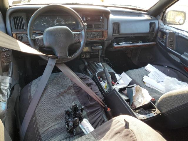 1J4GZ58Y9VC643300 - 1997 JEEP GRAND CHER LAREDO GREEN photo 8