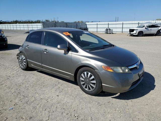 1HGFA16546L137337 - 2006 HONDA CIVIC LX SILVER photo 4