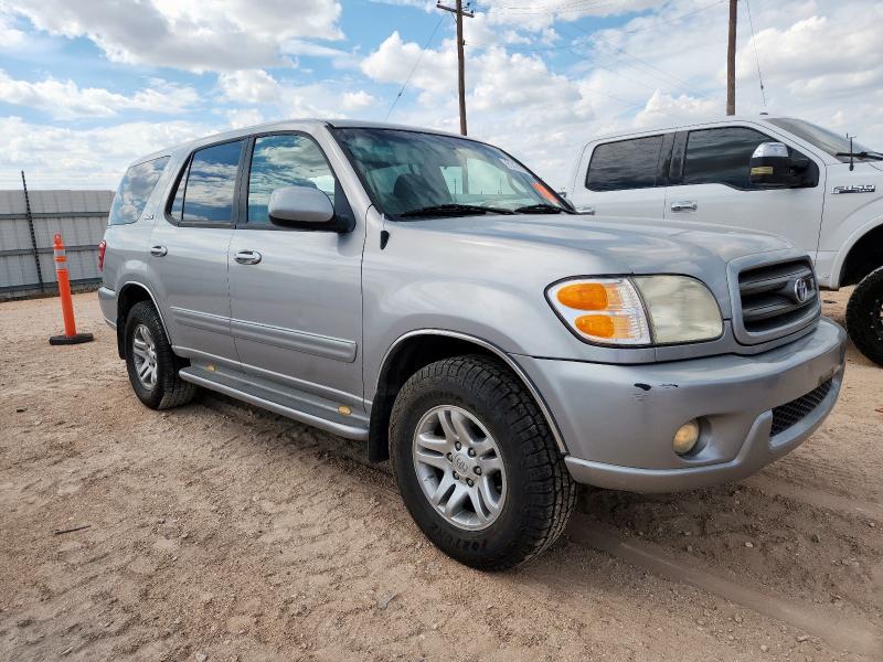 5TDZT34AX2S098893 - 2002 TOYOTA SEQUOIA SR5 银色 照片 4