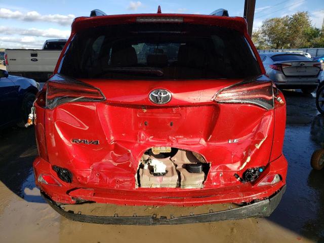 2T3ZFREV2GW293355 - 2016 TOYOTA RAV4 LE RED photo 6