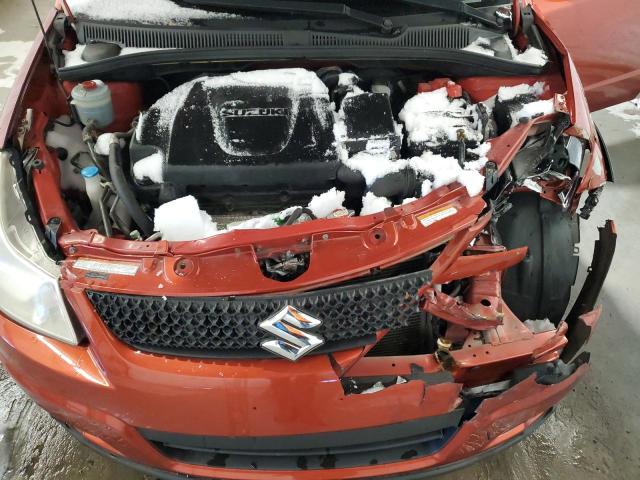 JS2YB5A34B6304425 - 2011 SUZUKI SX4 ORANGE photo 11