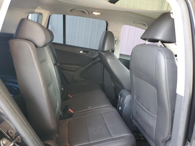 WVGBV7AX4AW528228 - 2010 VOLKSWAGEN TIGUAN SE BLACK photo 11