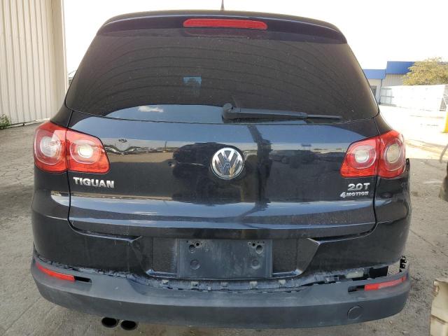 WVGBV7AX4AW528228 - 2010 VOLKSWAGEN TIGUAN SE BLACK photo 6