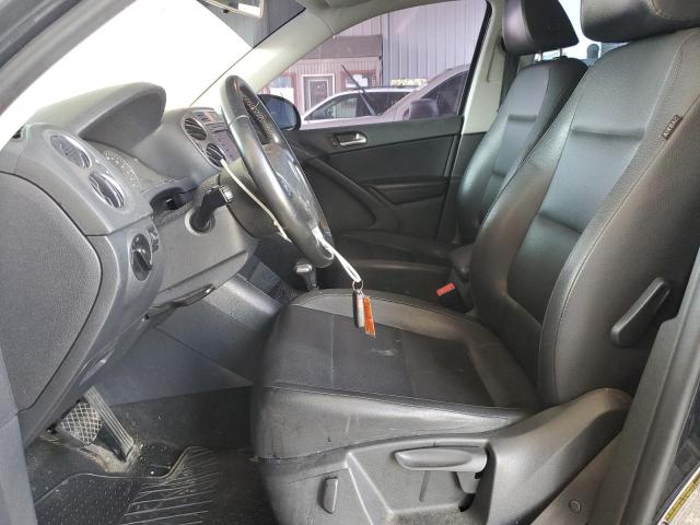 WVGBV7AX4AW528228 - 2010 VOLKSWAGEN TIGUAN SE BLACK photo 7