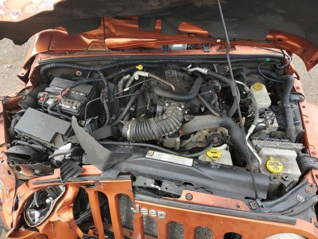 1J4HA5H15BL590766 - 2011 JEEP WRANGLER UNLIMITED SAHARA ORANGE photo 12