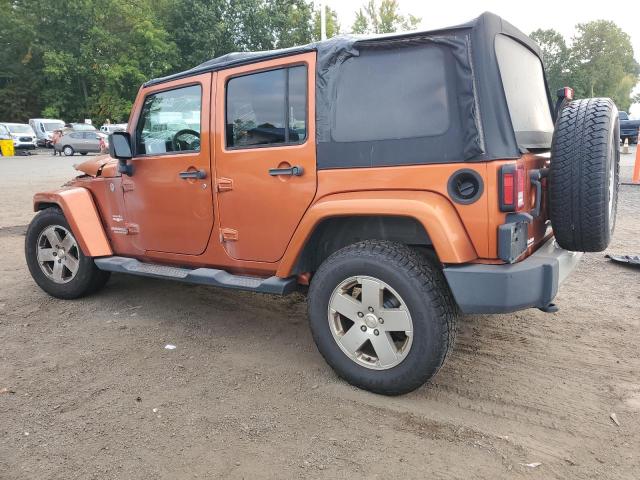 1J4HA5H15BL590766 - 2011 JEEP WRANGLER UNLIMITED SAHARA ORANGE photo 2