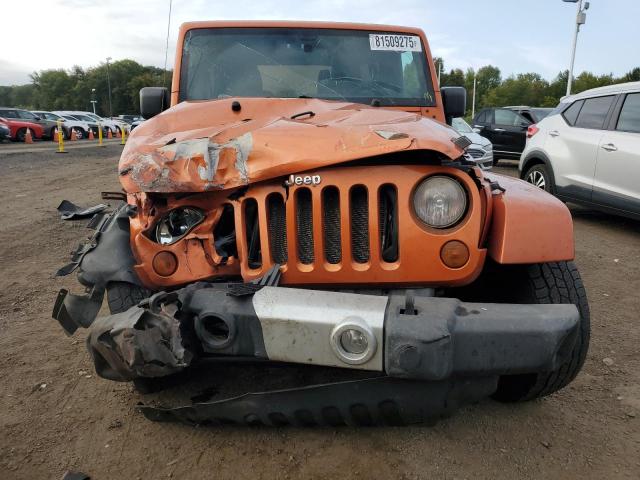 1J4HA5H15BL590766 - 2011 JEEP WRANGLER UNLIMITED SAHARA ORANGE photo 5