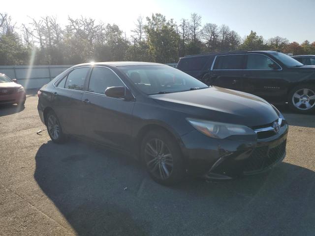 4T1BF1FK1GU183980 - 2016 TOYOTA CAMRY LE BLACK photo 4