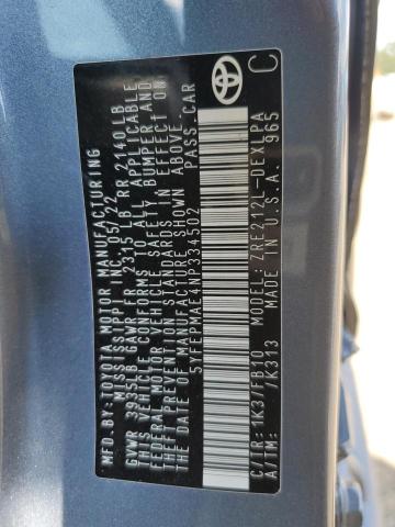 5YFEPMAE4NP334502 - 2022 TOYOTA COROLLA LE Blau Foto 12