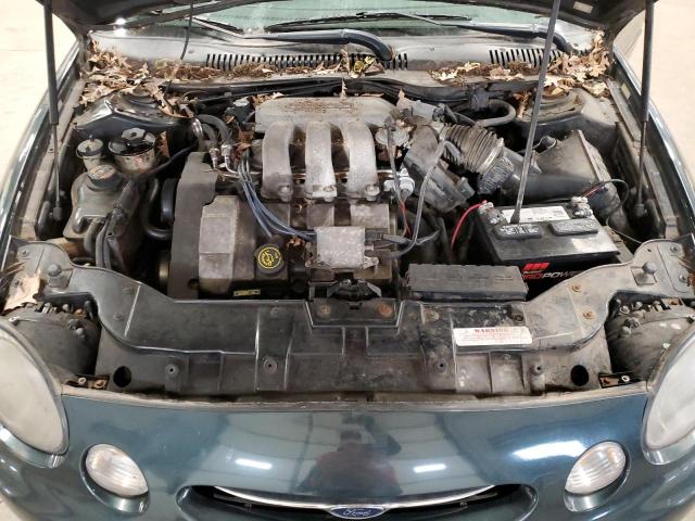 1FAFP53S8XG156049 - 1999 FORD TAURUS SE GREEN photo 11