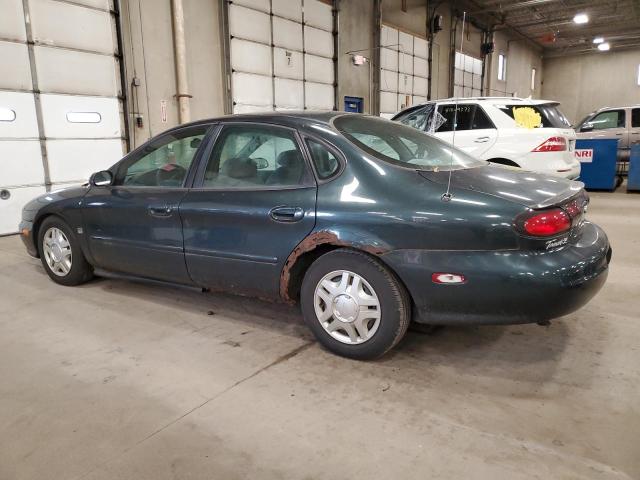 1FAFP53S8XG156049 - 1999 FORD TAURUS SE GREEN photo 2